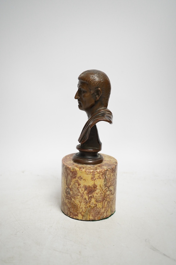 An early 20th century bronze bust of Menander on a marble stand, 19cm. Condition - some minor chips to marble otherwise good